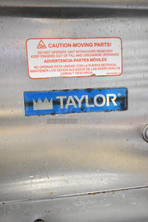 Taylor RD30-12 frozen drink machine, stainless steel, single flavor, commercial, 115V, caution label visible, used condition.