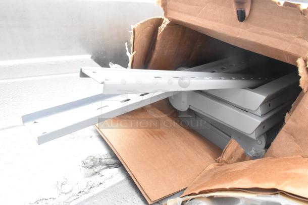 Box of 4 High Wall Rack T293-36, metal brackets, partially open box, new condition, showing assembly parts.