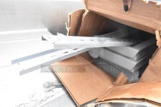 Box of 4 High Wall Rack T293-36, metal brackets, partially open box, new condition, showing assembly parts.