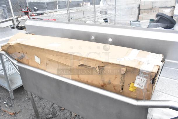 Box of 4 High Wall Rack T293-36 with visible wear and damaged packaging, showing shipping labels and handling marks.