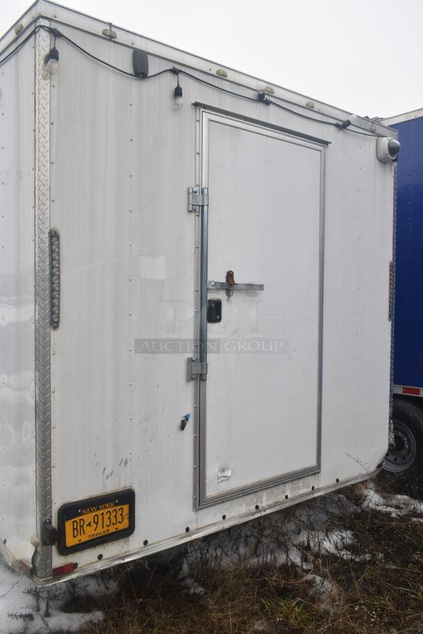 24' Stuff4less fast food trailer, fully equipped mobile kitchen, features Atosa prep table, coolers, Royal fryers, and more.