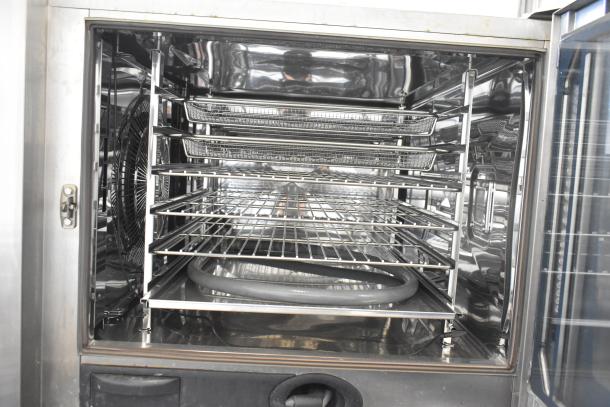 2019 Rational SCC WE 62 commercial combi convection oven, stainless steel, on double pan rack stand, 480V, 3-phase.