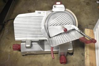 Berkel 827A-PLUS countertop meat slicer with built-in blade sharpener, working condition, 115 volts, 1 phase.