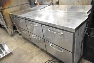 Continental CPA93 commercial pizza prep table with 6 drawers on casters, stainless steel, 115 volts, tested and working.