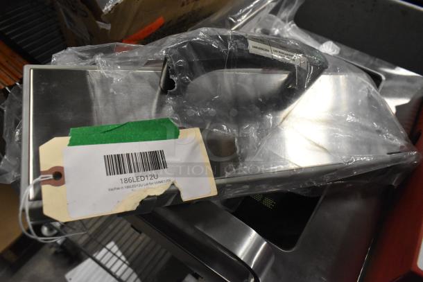 5 brand new items including a VacPak-It 186LED12U lid for UVME12SS, microwave door, and metal pieces, each tagged.