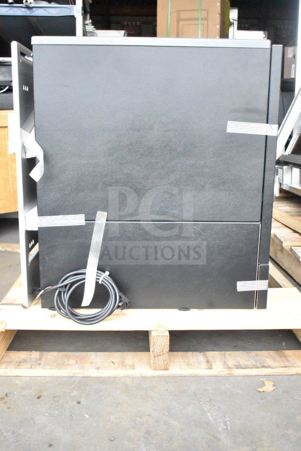 BRAND NEW SCRATCH AND DENT! Follett ID50 Commercial Ice Machine Head, black exterior, visible packaging tape, coiled power cable.