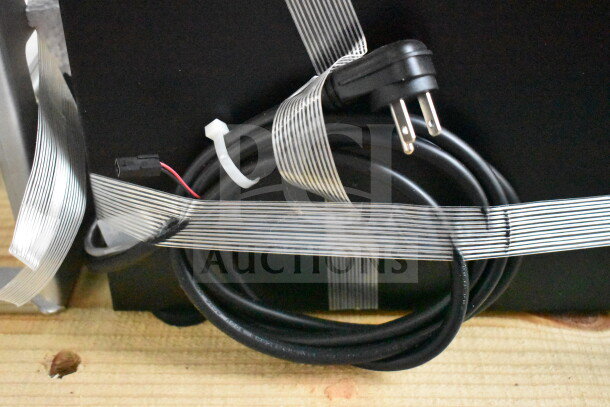 Brand new Follett ID50 Commercial Ice Machine Head, scratch and dent condition, with visible power cord and secure packaging.