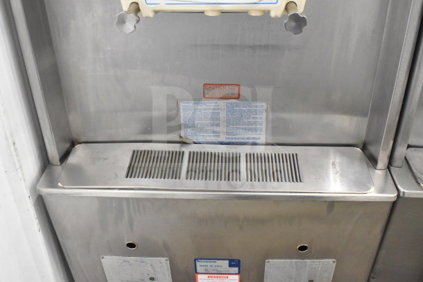 Taylor 754-33 Commercial Soft Serve Ice Cream Machine, dual flavor with twist option, air-cooled. Tags show voltage and phase details.