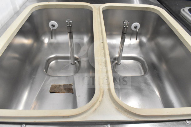 Taylor 754-33 soft serve machine interior, showing two stainless steel bowls. Air cooled, 2 flavor with twist.