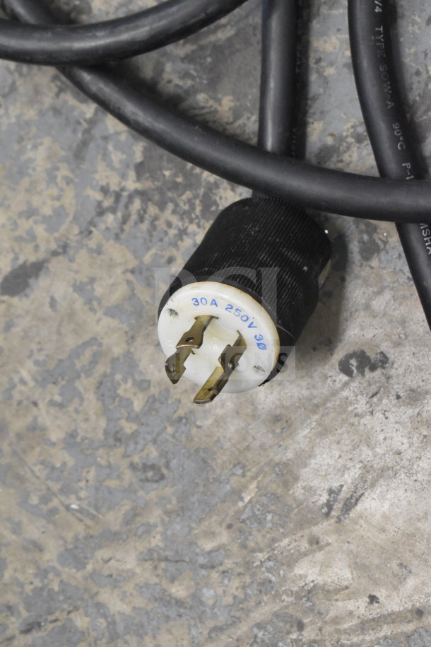 Power plug for Taylor 754-33 soft serve machine, 30A, 250V, 3-phase, with cables on a concrete floor.