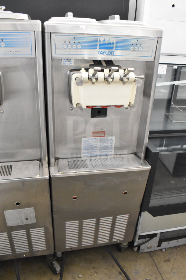 Taylor 794-27 soft serve machine, floor style, water cooled, 2 flavors with twist. Stainless steel, 208-230V, 1 phase.