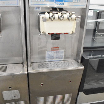 Taylor 794-27 soft serve machine, floor style, water cooled, 2 flavors with twist. Stainless steel, 208-230V, 1 phase.