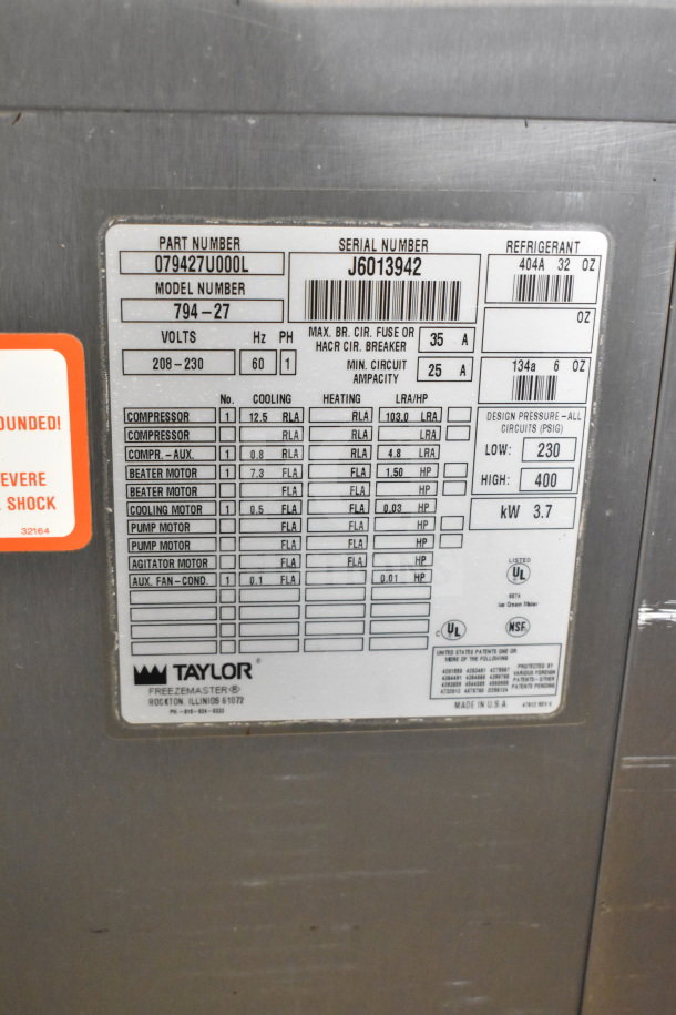 Taylor 794-27 commercial soft serve machine, water-cooled, 2 flavors with twist, 208-230V, 1 phase, model, and serial details shown.