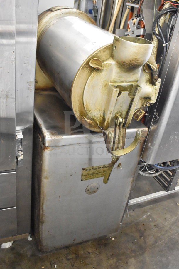 Emery Thompson 20-QT commercial batch freezer, floor style, visible wear, labeled for authenticity, stainless steel finish.
