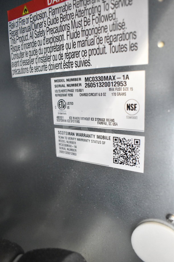BRAND NEW Scotsman MC0330MAX-1A ice machine, 365 lb. capacity, 115V, 1 Phase. ETL and NSF certified labels visible.