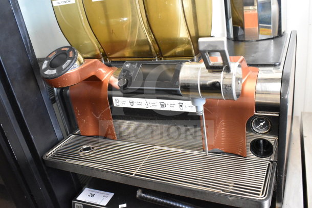 Thermoplan Mastrena M2-CS stainless steel espresso machine with LCD, hoppers, steam wand. Good condition; 208V, 1 Phase.