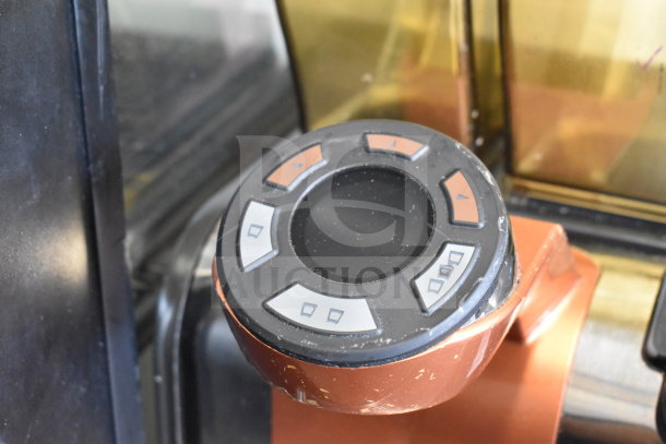Thermoplan Mastrena M2-CS espresso machine control dial close-up. Features button interface.