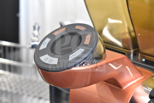 2022 Thermoplan Mastrena M2-CS espresso machine, orange control panel, LCD display, hoppers, steam wand.