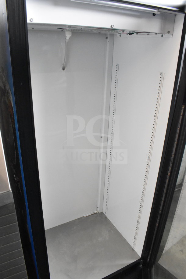 2018 True GDM-12-HC single door cooler merchandiser in good condition, 115 volts, 1 phase, spacious interior.