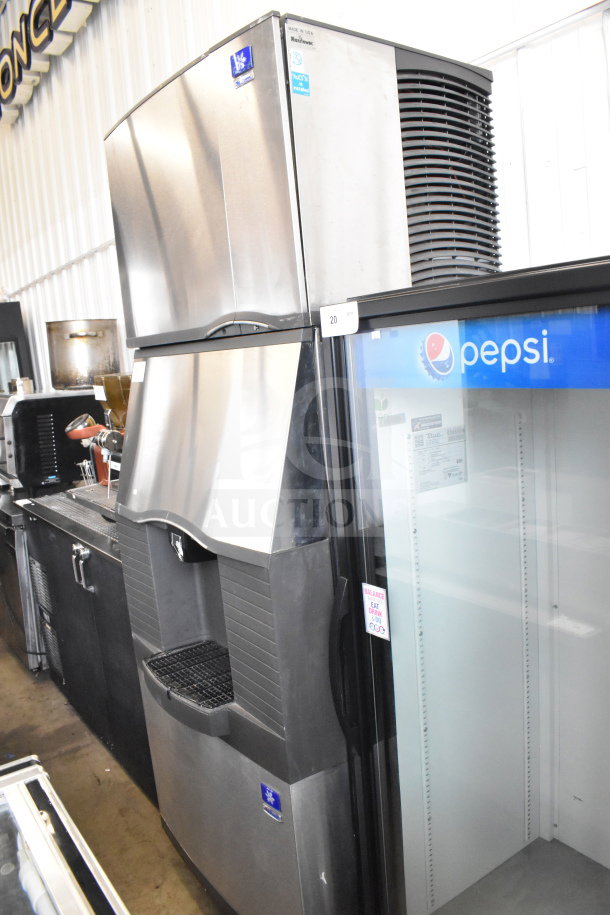Manitowoc SD0452A ice head on SPA310 dispenser, stainless steel, 115V, 1 phase, commercial use, good condition.