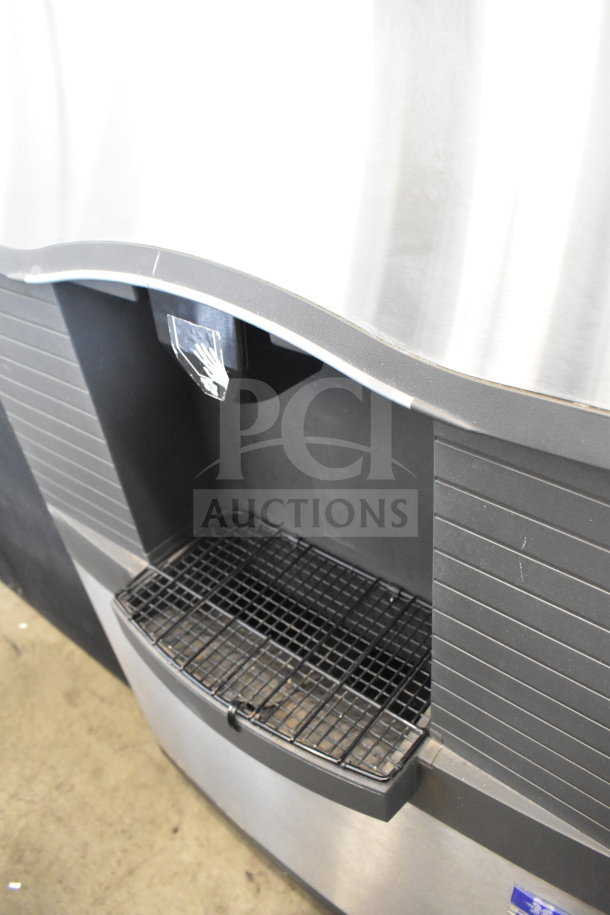 Manitowoc SD0452A ice head on SPA310 dispenser, stainless steel, 115 volts, 1 phase, excellent condition.