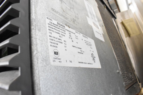 Manitowoc SD0452A ice head with SPA310 dispenser, 115V, 1 phase. Label shows model, voltage, and NSF mark.