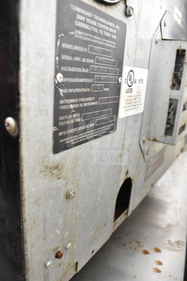 2019 Turbochef HHB2 rapid cook oven, commercial countertop, electric, 208/240V, label showing specs and wear marks.