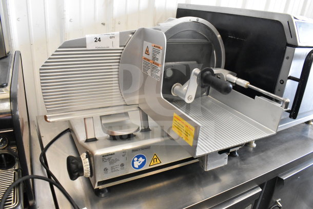 Bizerba VS12 commercial countertop slicer, 120V, 1 phase, excellent condition with safety and operation labels visible.