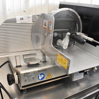 Bizerba VS12 commercial countertop slicer, 120V, 1 phase, excellent condition with safety and operation labels visible.