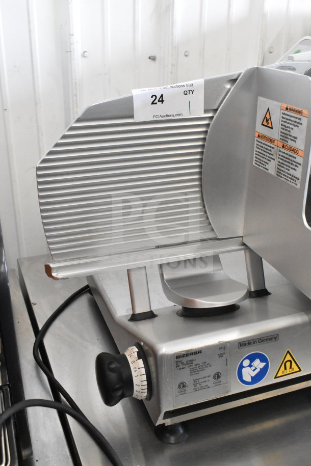 Bizerba VS12 commercial slicer, 120V, 1 phase, stainless steel, adjustable knob, "Made in Germany" label, excellent condition.