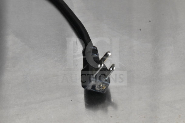 Close-up of a power cord plug for the Continental SW60 Commercial 2 Door Undercounter Cooler, 115 Volts, 1 Phase.

