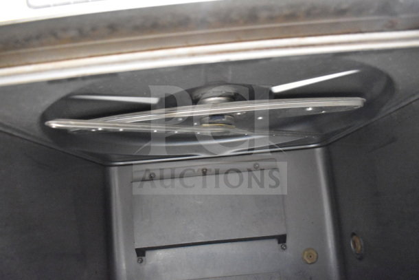 2017 Hobart LXER commercial undercounter dishwasher interior view, showing spray arm mechanism. Model in good condition.