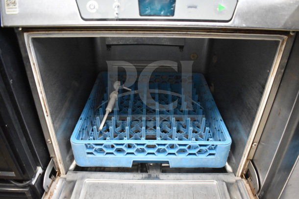 2017 Hobart LXER commercial undercounter dishwasher, 120/208-240V, 1 phase. Features blue dish rack, stainless steel interior.