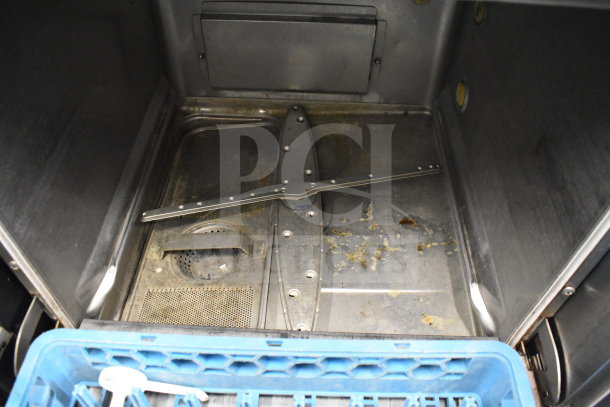 2017 Hobart LXER commercial undercounter dishwasher, interior view showing sprayer and rack, used condition.