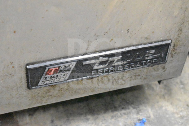 True TUC-48 two-door undercounter cooler, visible label indicates brand and model. Commercial casters, 115V, 1 Phase.