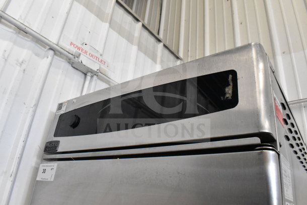 2018 Winston HOV514UVE CVap heating cabinet, stainless steel, on casters; visible tags show model and auction details.