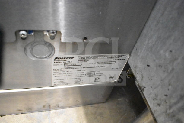 Follett 50CT400A commercial ice machine, nugget style, 115 volts, 1 phase, features label with model and refrigeration details.