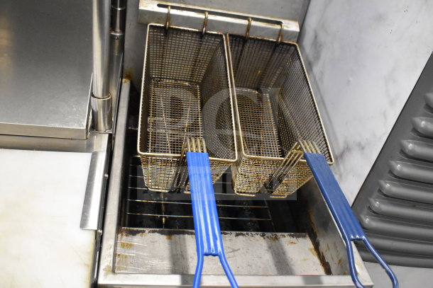 Vulcan LG400-1 commercial deep fryer with double baskets, blue handles. Natural gas, 120,000 BTU, used condition.