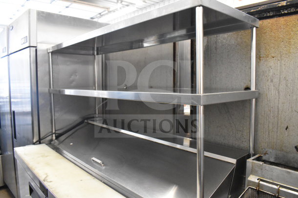 2021 Atosa MSF8303GR commercial prep table with mega top, two shelves. Stainless steel, 115V, 1 phase. Excellent condition.