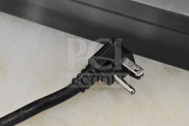 Close-up of a power plug for the 2021 Atosa MSF8303GR Sandwich Prep Table, 115 Volts, 1 Phase.