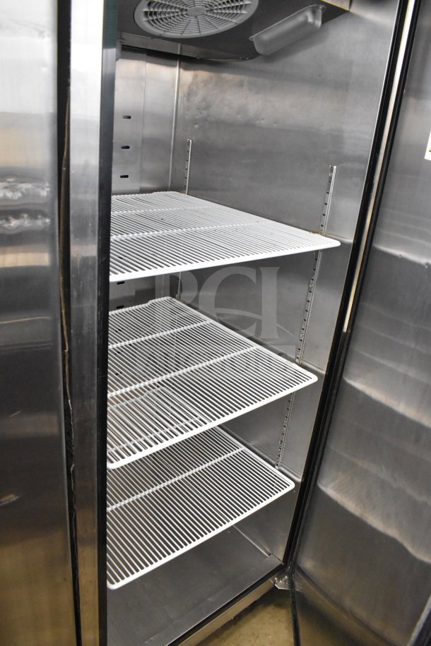 2021 Atosa MBF8004GR commercial cooler, single door, stainless steel, adjustable shelves, on commercial casters.