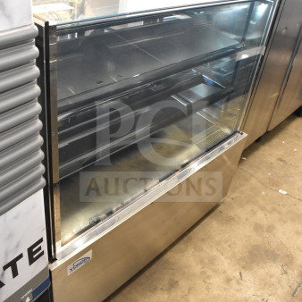 Yukon commercial deli display case merchandiser, glass front, 115V, 1 phase, in good condition.