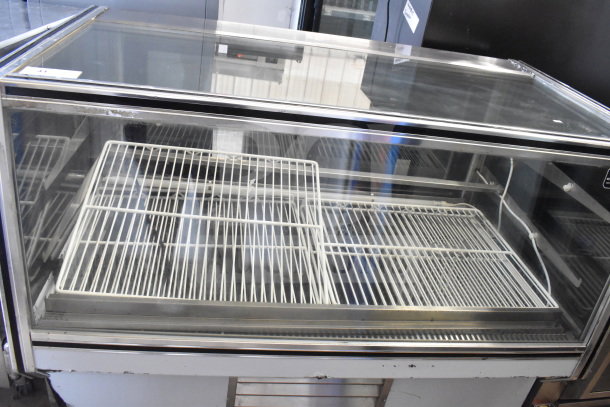 2017 Leader CBK57 S/C deli display case, commercial floor style, with glass front and metal racks, 115V, 1 Phase.