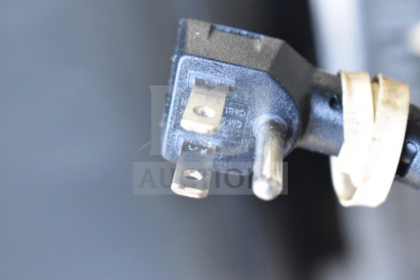 Close-up of electrical plug for 2018 Alto Shaam 1200-S Heated Holding Cabinet, 120 Volts, on commercial casters.