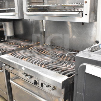 Jade Range commercial 6-burner gas range with salamander cheese melter, stainless steel, used, visible controls and grates.