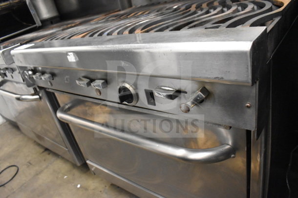 Jade Range commercial 6-burner gas stove with salamander cheese melter, stainless steel, good condition, visible control knobs.