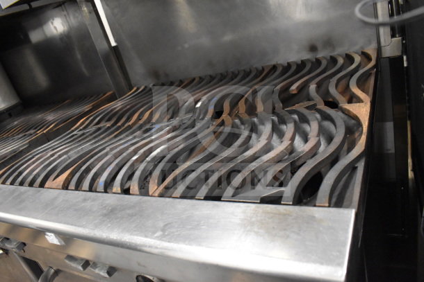 Jade Range 6-burner gas stove with salamander cheese melter, commercial grade, steel construction, used condition.
