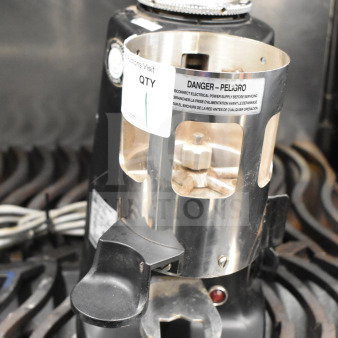 Mazzer Luigi Super Jolly Timer espresso grinder base, 120V, 1 phase, with visible safety and quantity labels, in used condition.