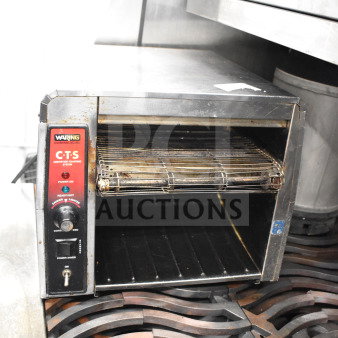 Waring CTS1000 commercial conveyor toaster oven, electric, 120V, used condition with visible wear on exterior, model CTS1000.