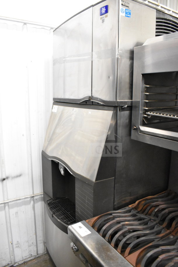 Manitowoc SD0452A ice head on SPA310 dispenser. Stainless steel, 115V, 1 phase. Used condition, visible Manitowoc branding.